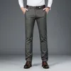 Мужские джинсы осени и зимние повседневные брюки бизнес серовато черно -синий темно -серое цветение 260Q