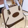 Luxurys Designers Boston Tote Shoulder Bags Women Fashion Designer High Quality Brown Canvas Real Leather Zipper Crossbody Handbag Purses Clutch Bag