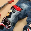 Novos homens jeans estilo americano 100% algodão denim hip hop patchwork de bandeira nacional moda jeans homens # 597 201116