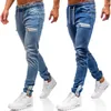 Мужские джинсы тощие мужчины бойфрея уличная одежда хип-хоп дизайнер джинсовые брюки с карманами мода отверстие брюки мужская одежда 4xL