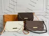جلد طبيعي 40718 حقيبة اليد المفضلة أزياء المرأة حقيبة crossbody سيدة مصمم سلسلة حقائب مخلب سلسلة الشريط