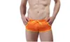 Partihandel-sommar mode varumärke män sexiga bulging påse nitar mini boxare badkläder / gay gym swim trunks / beach board shorts