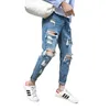 Toppkvalitetsbesvär tiggare jeans manlig jätte rippad hål stiliga manliga fötter hiphop streetweat cowboy harem byxor män 201128