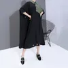 Nya kvinnor sommar svart lapptäcke lång skjorta klänning plus storlek lapel metall ring hål lady unik avslappnad klänning robe femme 6163 t200521
