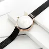 MENS Titta på kvinnor Shengke Ultra Thin Watch Quartz Movement Ladies Watches Rostfritt stål Mesh Stylish Silver Quartz Watch Female Clock