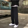 Sweatpants män raka harem byxor manlig koreansk man lös casual byxor höst streetwear cn (ursprung) full längd fyra årstider 220303