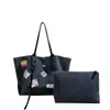 Kot omuz 2021 Yeni çok yönlü tuval çıkartma rozeti tote çanta alışveriş büyük kapasiteli çanta tasarımcısı çantalar çanta