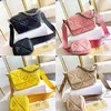 Bolsas de noite Bolsas de designer de moda Bolsa de ombro de luxo de alta qualidade Bolsas de couro Bestselling Mulheres Crossbody Bag Peito Pack Lady Tote Chains Bolsas 002