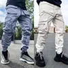 2022 Nya Mens Reflekterande lastbyxor Hip Hop Techwear Harem Pant Jogger Sweatpants med fickor Jogging Punk Techwear Trousers G220224