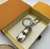 Fashion Keychain Buckle Letters Astronaut Metal Corkscrew Designer Handmade Leather Circle Keychains Men Women Bag Pendants Key Ring