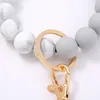 Holz-Quastenperlen-Armband, Schlüsselanhänger, lebensmittelechtes Silikon, Perlen-Armbänder, Damen- und Mädchen-Schlüsselanhänger, Handgelenkschlaufe, Perlenarmband-Armbandketten für mit Leder