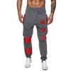 New Men Star Prints Pantalons de survêtement Hommes Pantalons de survêtement décontractés Striped Patchwork Joggers Pantalons Mode Hip Streetwear LJ201103