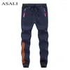 Pantalon Skinny Slim Straight Men Loose Joggers Streetwear Harem Pantalon Longueur cheville Gyms Pantalon de survêtement Pantalon Pantalon élégant 201110