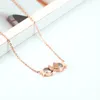 High Quality Womens Rose Gold Plated Stainless Steel Kiss Fish Necklace for Sale