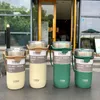 Bouteilles de café en acier inoxydable de 710 ml avec bouteille d'eau d'isolation portable en plein air avec corde suspendue en silicone