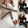 Tute da donna alla moda Felpa di alta qualità super soft pop Stampa leopardata Tasca a maniche lunghe Cerniera con stampa felpata Pantaloni con cappuccio autunno e inverno