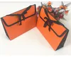 100ピース折りたたみギフトボックス包装袋シルクスカーフハンカチ封筒包装箱紫外線オレンジSN4967