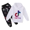 Conjunto de calças casuais da moda TIK TOK para meninos e meninas suéter 310e8302129