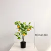 装飾的な花の花輪のシミュレーションの植物の木人工的な鉢植えのプラスチック盆栽黄色のオレンジの果実居間のための屋内装飾