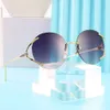 Ronde metalen zonnebril damesmode wholale sunglass stijlvolle feest glas bruiloft trend product gafas de sol mujer
