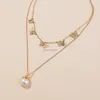 collier de la chaîne perle et or