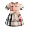 Nya Baby Girls Dress Kids Laple College Wind Bowknot Kortärmad Pläterad Pikétröja Skirt Barn Casual Clothing Kids Designer Kläder