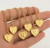 gold name necklace with heart