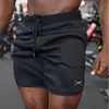 New Men Gyms Fitness Loose Shorts Bodybuilding Joggers Summer Quickdry Cool Short Pants Male Casual Beach Brand Sweatpants T200512