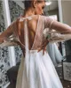 2022 Polka Dot Boho Beach Wedding Dresses Long sleeve Bridal Gowns With Cuffs Sexy Open Back Bow A-Line Silhouette Modern And Stylish Bride Dress Rustic Vestidos