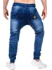 Mode-Herren Coole Designermarke Schwarze Jeans Skinny Reißverschluss Drapierte Jeans Herren Smart Casual Frenum Cargohose