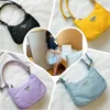 Meisje handtassen nylon effen kleur een-schoudertassen kinderen schattige brief casual draagbare messenger bag accessoires 7 kleuren