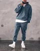 남자 Tracksuits 2021 망 스포츠 정장 폴라 플리스 느슨한 유행 패션 까마귀와 스웨트 팬츠 캐주얼 스타일