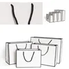 White Present Paper Bags Kraft Card Packaging Bag Cloth Fashion Storage Handbag Thickening Shopping Advertising Custom HH9-3619