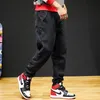 Mäns Jeans Fashion Streetwear Men Spliced ​​Designer Denim Cargo Pants Plus Size 28-44 Hip Hop Joggers Vinter Velvet Varma Långt byxor