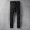 Pantaloni da uomo Pantaloni da uomo Moda Casual High Street Tide Marca Jeans strappati neri Pantaloni in denim elasticizzato con patch modello1