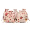 10 * 14cmchristmas Drawstring Bags Bomull Linen Småpåse Tygdukar Mode Mönster Jute Sack Kids Candy Gifts Storage Bag Protbara plånböcker