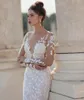 2021 A Line Wedding Dresses Lace Appliqued Sheer Long Sleeve Overskirt Bridal Gowns Open Back Sexy vestido de novia