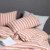 新しいベッドルーム4ピースベッドリネンセット冬の厚い暖かい綿ストライプ羽毛布団カバーファッションシンプルな家族ホテルの寝具セット1