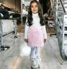 Sensation confortable jupe en fourrure enfant en bas âge vêtements automne et hiver bébé vêtements rose imitation cachemire jupes en peluche pour les filles douces