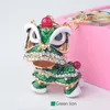 Kreativ present Kinesisk stil Lion Dance Alloy Key Ring Fashion Girl Bag Hängande Bil Pendant 7Colors