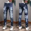 Man nödställda denimbyxor skador bleknade fem fickor Clement Fit Jeans Slim Leg Wash Effects Mens308U