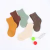 5 paires / Lot Garçons Filles Laine Chaussettes Enfants Hiver Chaussettes Épaisses Enfants Couleur Pure Laine Chaude 2-12 Ans LJ201216