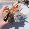 5pcs كامل Diamond Bear Doll -keychain الأزياء الكريستال اللطيف كرتون Keyring keyring سلسلة سيارات سحر حلية الهدايا الملحقات