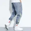 Мода разорванные джинсы для мужчин 2021 новых четырехсезонных свободных гарема джинсов джинсов на улицу хип-хоп