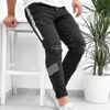 Mäns Skinny Jeans Side Stripes Ripped Frayed Slim Fit Denim Byxor Hip Hop Black StreetWear Rolled Edge Casual Jean Trousers Men C1123