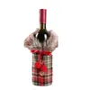 Nuova copertura creativa del vino con vestiti di bottiglia di lino scozzesi dell'arco con lanugine Copertura creativa della bottiglia di vino Natale di modo