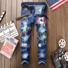Jeans para hombres 2C europeos y americanos delgados tubo recto elástico palo insignia agujero moda comercio exterior pantalones 1806 # 1