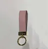 High Qualtiy Leather Keyring Holder Märke Keychain Designers Män Kvinnor Karväska Nyckelring med låda Aim990a