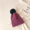 Baby varm solid färger hattar kanin hår pompom boll kepsar barn barn öronskydd imitation vind stickad hatt killar tjejer ullmänniska