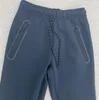 Nowa kosmiczna bawełniana tkanina biegowa Spodnie Spodnie Technotle Casual Pants Cu4502